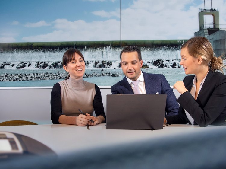 Aquila Capital team memebers in a meeting