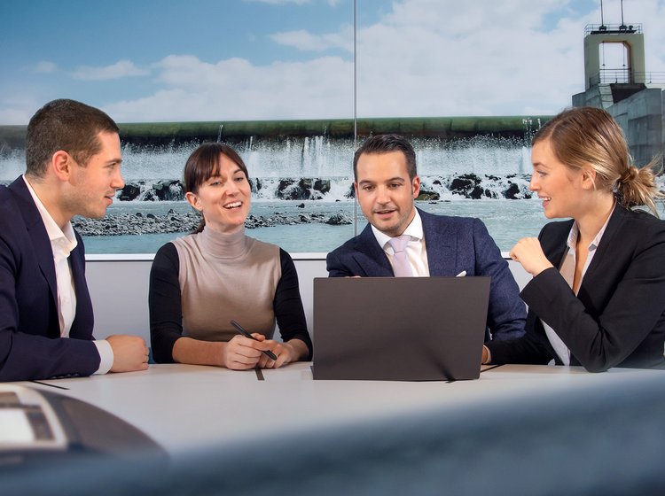 Aquila Capital team memebers in a meeting